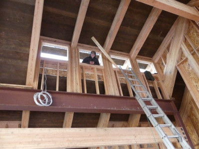 Henry Poking His Head Indoors While Installing The Roof On Ponderosa